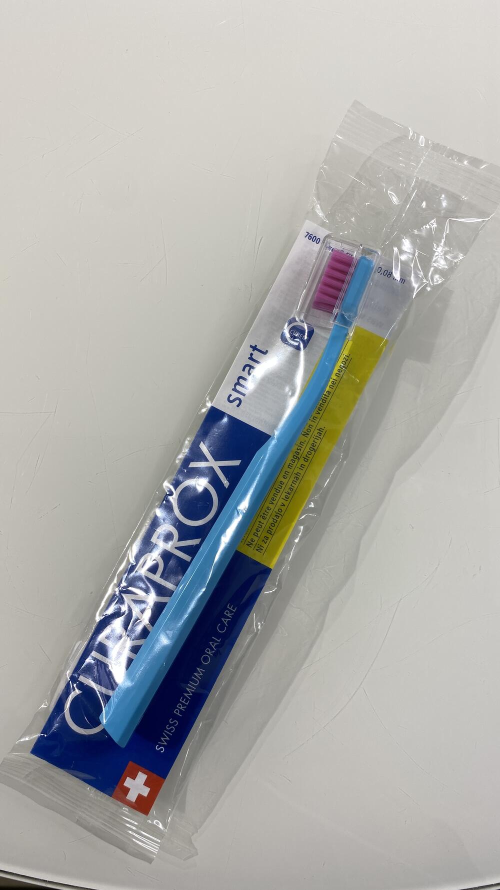 Зубна щітка Smart дитяча у полиетилені бірюза з рожевим Curaprox